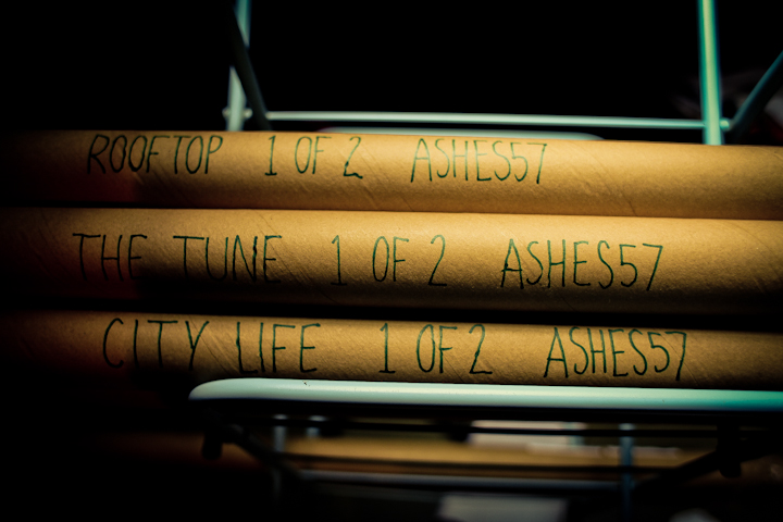 A selection of hand signed, limited edition prints, T-shirts and stickers by Ashes57.